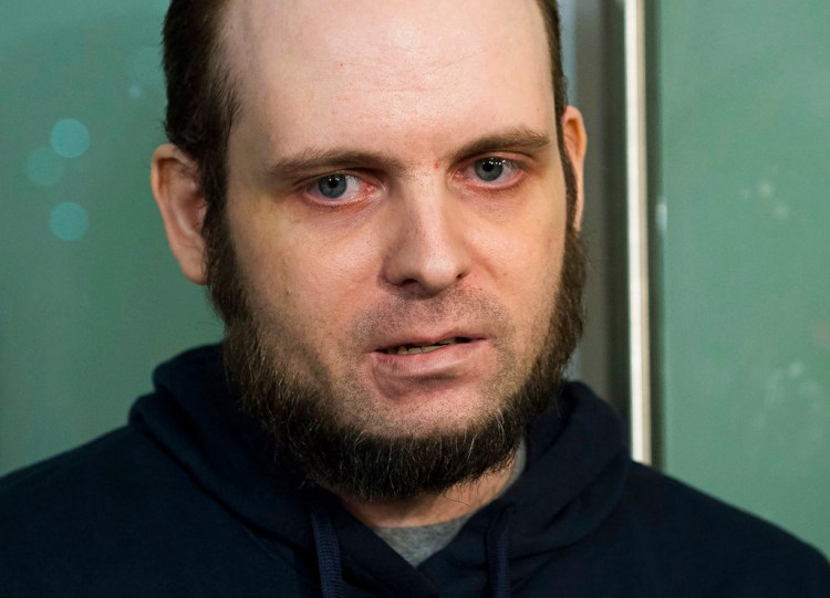 Joshua Boyle speaks to the media after arriving at the airport in Toronto on Oct. 31, 2017. Boyle was freed with his American wife and children after years of being held hostage in Afghanistan.
