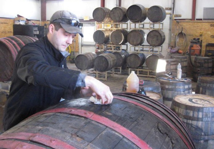 Matt Albrecht, owner and founder of River Drive Cooperage-Millwork, prepares a barrel he imported from Hungary for shipment to Michigan. The company began to export their barrels to Iceland last year after participating in a Maine Beer Box event. So far the Buxton company has earned more than $120,000 in export sales to Iceland.

