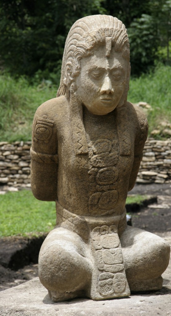 A 1,300-year-old limestone sculpture of a captured Mayan warrior.