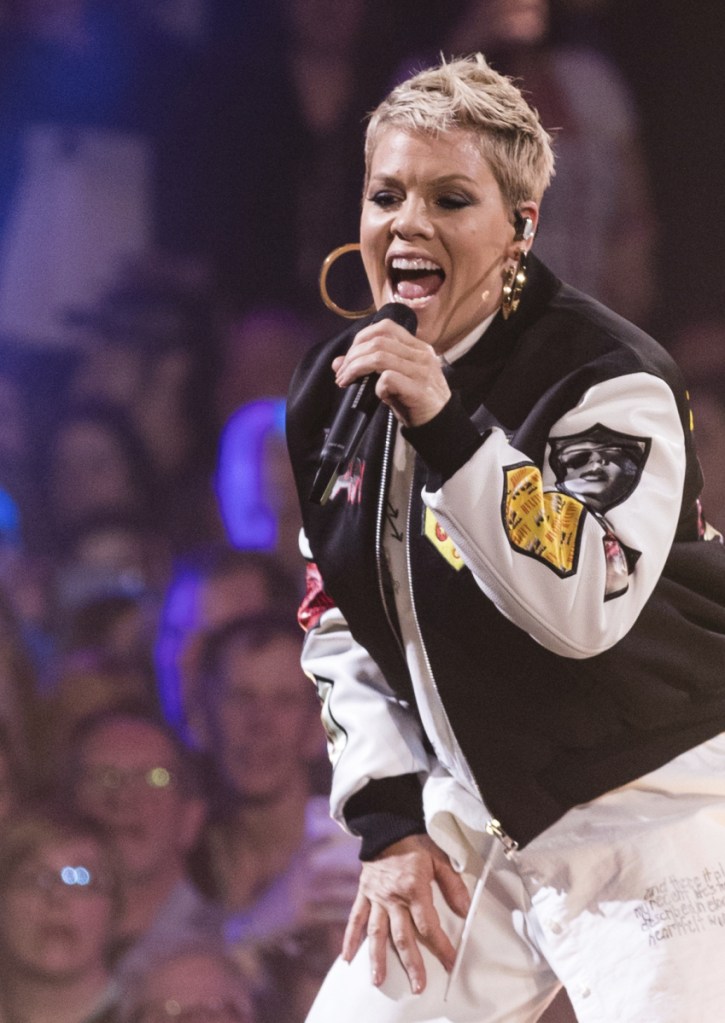 Pink performs at The Armory on Friday in Minneapolis at a pre-Super Bowl concert despite having the flu.