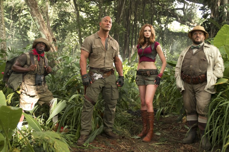 Kevin Hart, from left, Dwayne Johnson, Karen Gillan and Jack Black star in "Jumanji: Welcome to the Jungle." According to studio estimates Sunday, "Jumanji" grossed $11 million over the weekend.