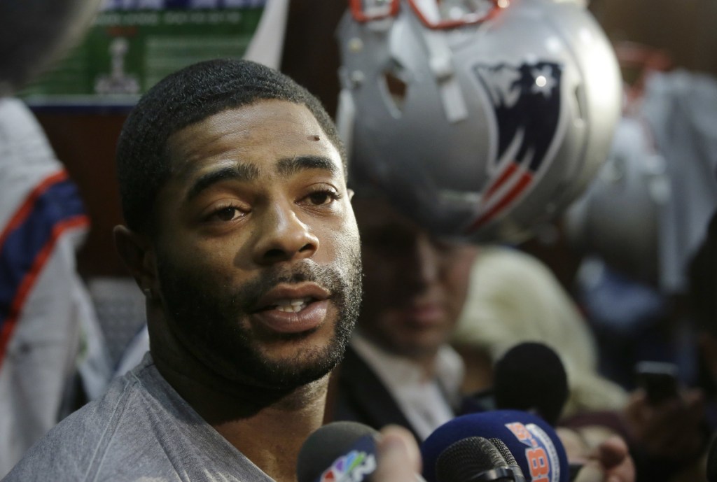 New England Patriots cornerback Malcolm Butler speaks with reporters in the team's locker room before an NFL football team practice, Wednesday, Nov. 23, 2016, in Foxborough, Mass. (AP Photo/Steven Senne)