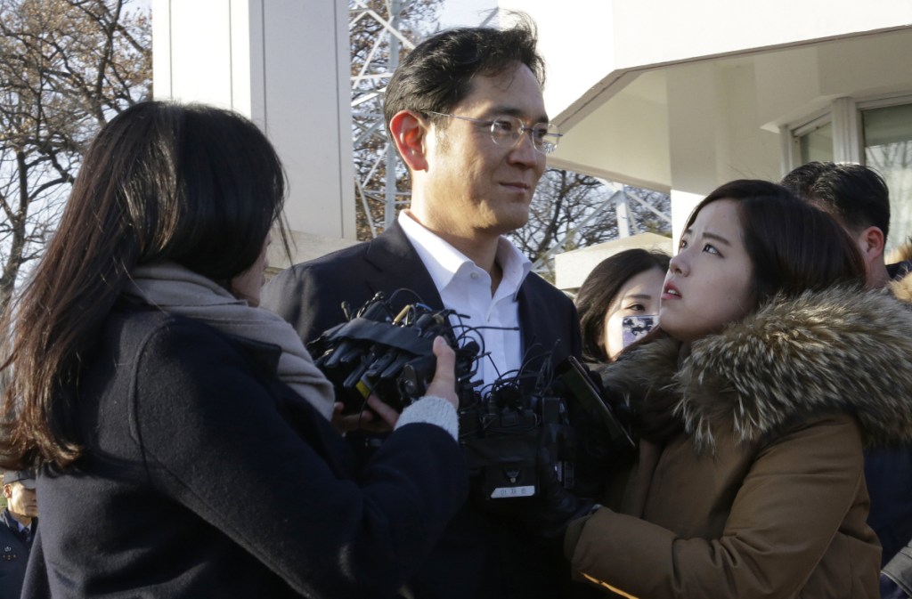 Lee Jae-yong, vice chairman of Samsung Electronics, leaves a detention center in Uiwang, South Korea, on Monday. Lee served less than a year after being convicted of bribery, embezzlement and perjury.