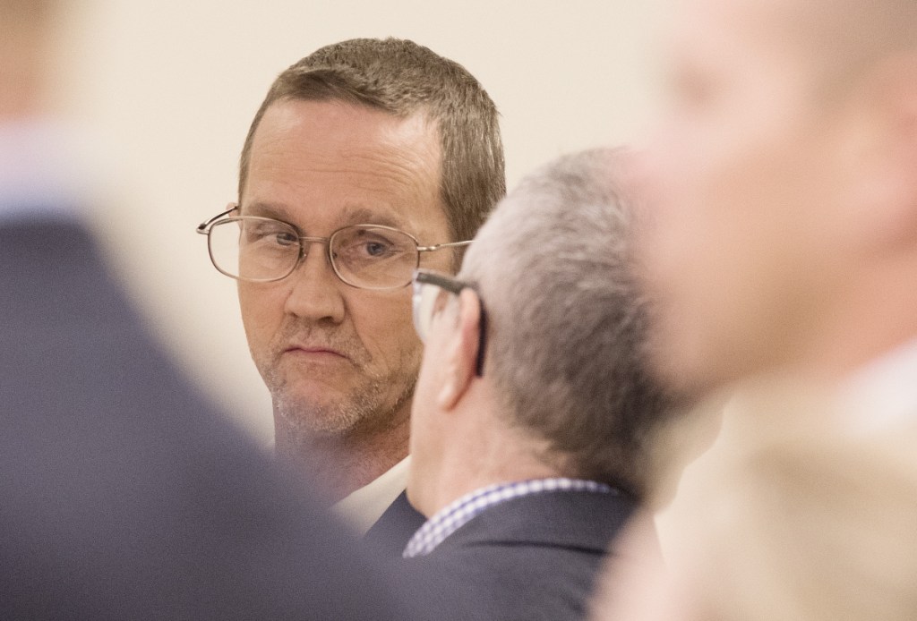 Philip Scott Fournier listens to his attorney, Jeffrey Silverstein, in a court appearance in 2016. 