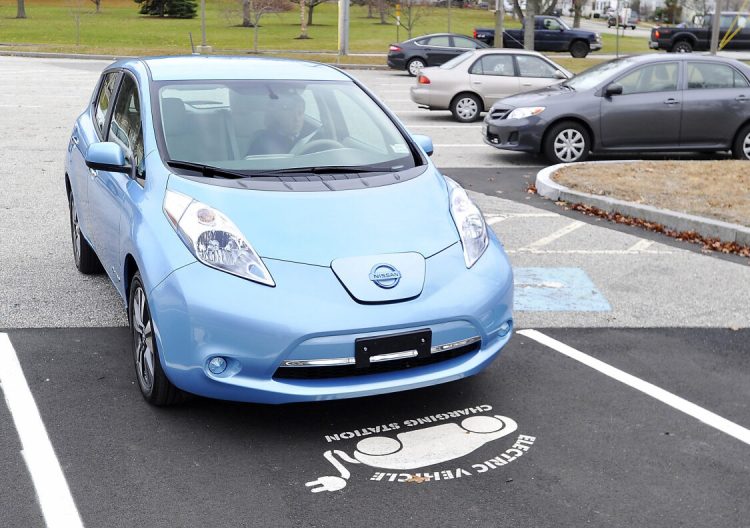 The Maine DOT is proposing a $250 annual fee on all-electric cars, like this Nissan Leaf owned by the city of South Portland, and on gas-electric hybrids. A letter writer wonders if the fossil fuel industry is behind the idea.