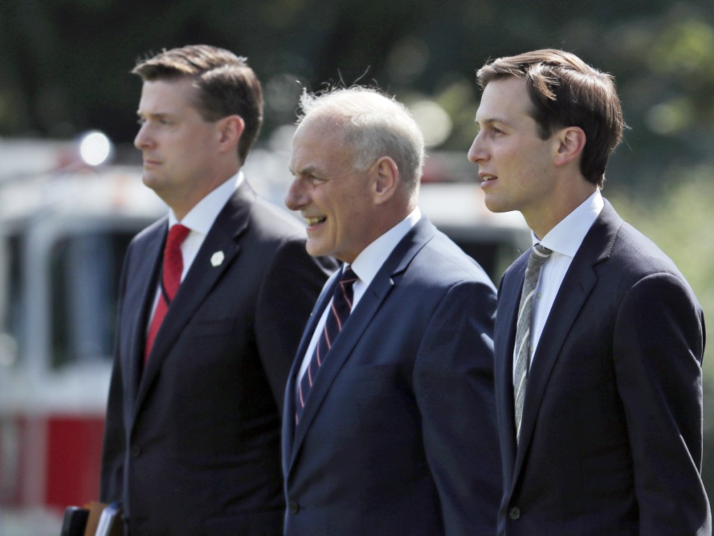 White House Staff Secretary Rob Porter, left, was at first defended by Chief of Staff John Kelly when his ex-wives alleged abuse. White House adviser Jared Kushner is at right.