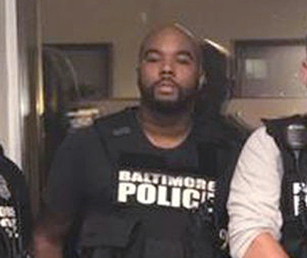 Detectives Marcus Taylor, left, and Daniel Hersl are on trial in Baltimore.