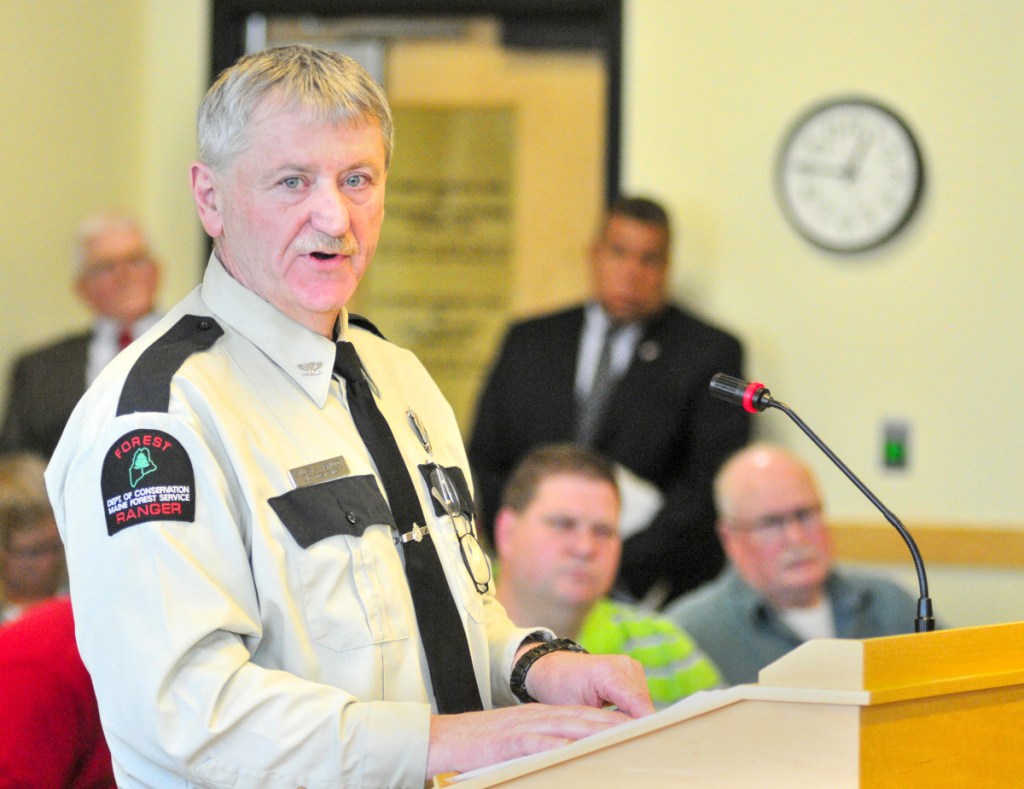 Chief Forest Ranger William Hamilton testifies Thursday during a hearing on L.D. 1809, a measure that lawmakers say will make it even clearer that they intended that state residents have the option to get free online burn permits from private, third-party systems.