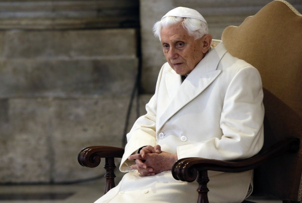 Pope Emeritus Benedict XVI attends a Mass at St. Peter's Basilica in 2015 on the fifth anniversary of his historic decision to retire