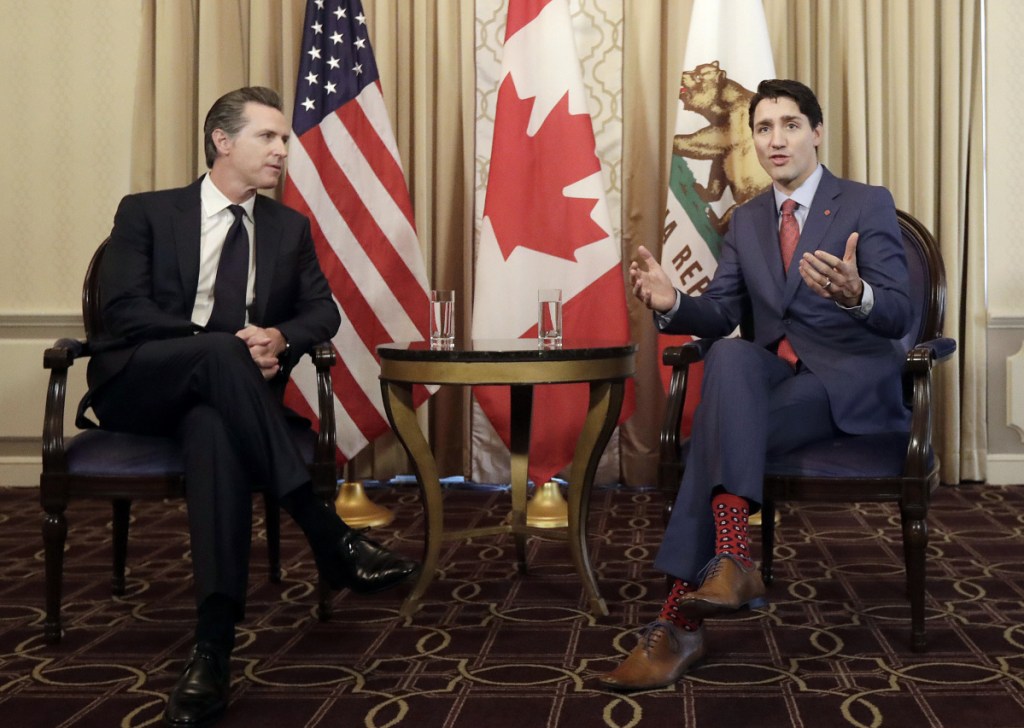 Canada's Prime Minister Justin Trudeau, right, meets Friday with California Lt. Gov. Gavin Newsom in San Francisco. Newsom said he welcomed Trudeau's "energetic leadership on the international stage."
