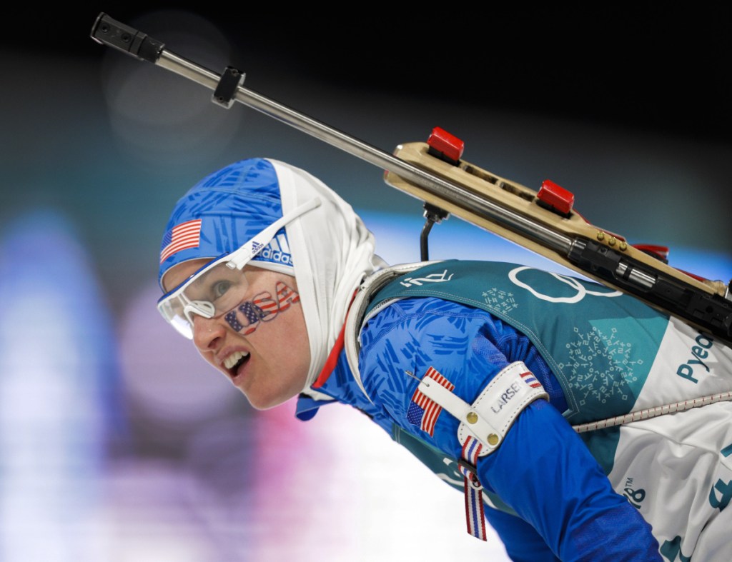 Clare Egan looks at her time after finishing the 7.5-kilometer biathlon sprint Saturday in PyeongChang, South Korea. Egan hit seven of 10 targets and was 2:45.4 behind winner Laura Dahlmeier of Germany.