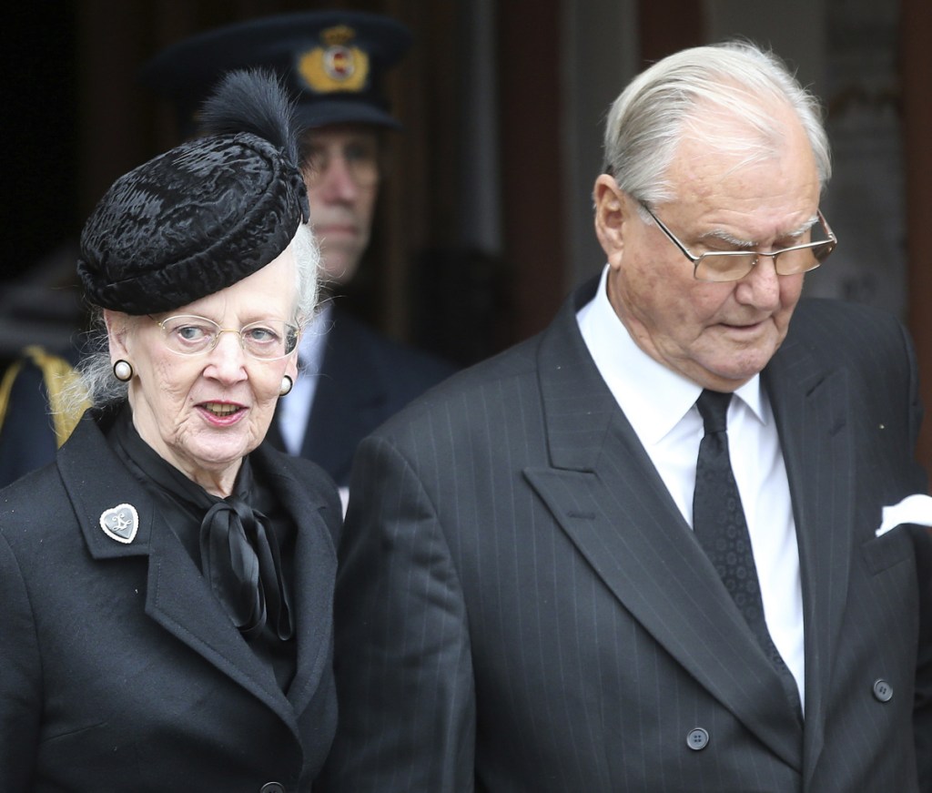 Queen Margrethe of Denmark and her husband, Henrik, leave the funeral service for Prince Richard of Sayn-Wittgenstein-Berleburg, in Bad Berleburg, Germany, March 21, 2017.