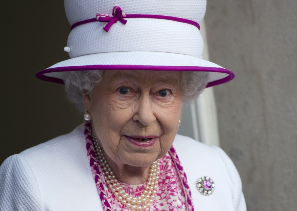 Britain's Queen Elizabeth II visits Marlborough House, in London, Thursday June 9, 2016,  to launch a new Commonwealth Hub which brings Commonwealth organisations together in the same location to create a collaborative, dynamic and innovative way of working. (Hannah McKay/Pool Photo via AP)