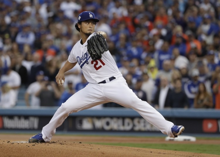 Former Dodgers starting pitcher Yu Darvish throws during the first inning of Game 7 of the World Series against the Astros in Los Angeles.