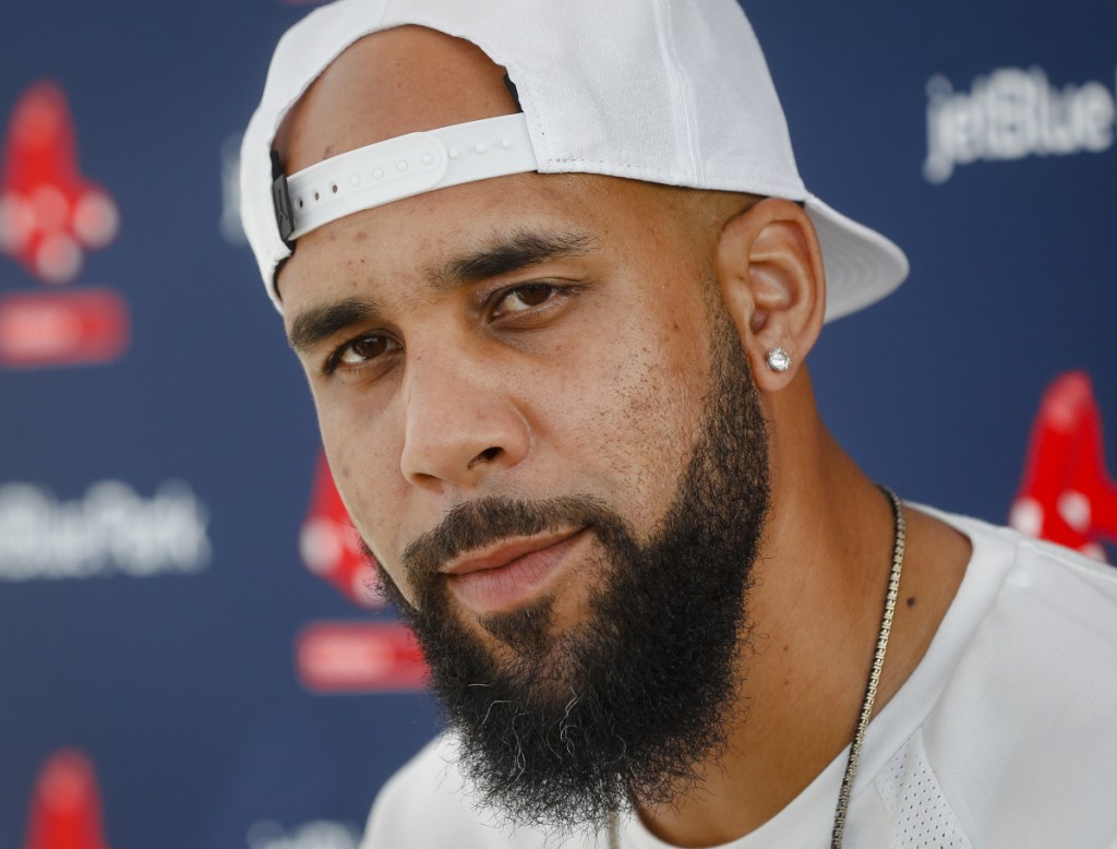 Boston Red Sox pitcher David Price speaks to the media at baseball spring training, Tuesday, Feb. 13, 2018, in Fort Myers, Fla. (AP Photo/John Minchillo)