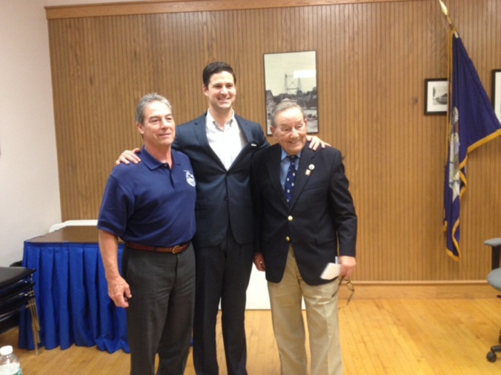 Paul Mitchell, at right, is flanked by City Manager Michael Roy and Mayor Nick Isgro in September 2016 at a City Council meeting where he was honored for his many years of service to the city. The city's annual report for 2015-16 was dedicated to Mitchell, and he was given a copy of it that night.