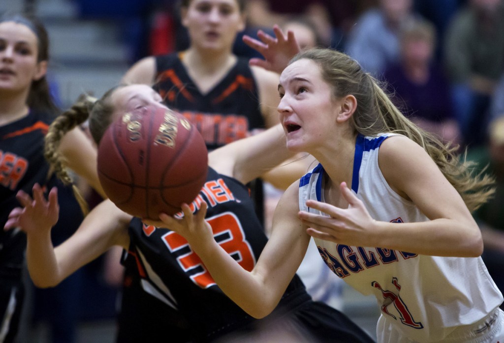 Photo by Ashley L. Conti 
 Messalonskee's Brianne Benecke, right, is fouled by Gardiner's Bailey Poore during the first half of their Class A North game last month in Oakland. Both teams will play in the tournament beginning today.