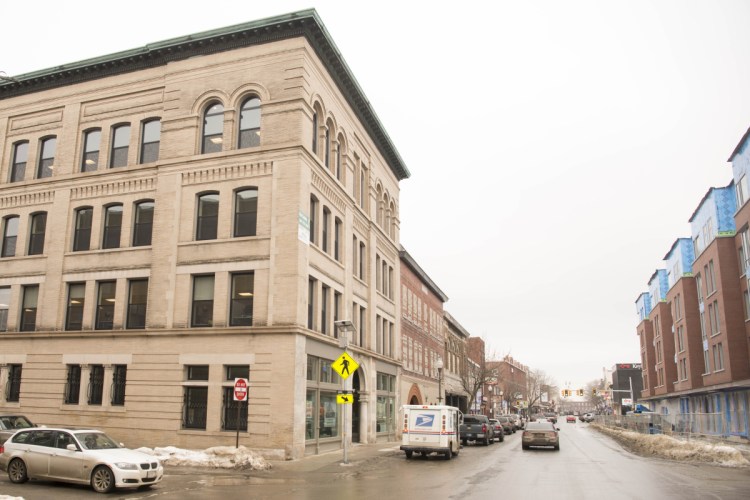 The Portland Pie Co. has signed a lease with Colby College to occupy ground floor space in the Hains Building, on the left, at the corner of Main and Appleton streets and across Main Street from Colby's new residential complex, seen under construction on the right.
