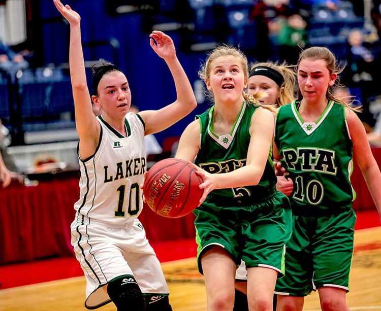 Emily Schlisner of Pine Tree Academy goes to the basket in front of Rangeley's Brooke Egan during a Class D South quarterfinal Monday in Augusta. Rangeley won, 55-28.