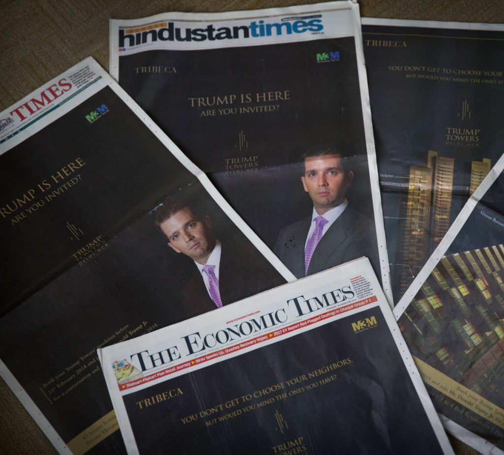 Donald Trump Jr.'s Trump Towers ads are seen in newspapers in New Delhi, India on Tuesday. Trump Jr. is in India to sell luxury real estate and will later speak at a business summit.
