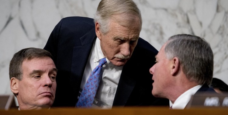 Sen. Angus King, center, at a recent Intelligence Committee hearing, says he continues to hear from Mainers who believe that reports of Russian interference in the 2016 U.S. election are nothing but fake news.