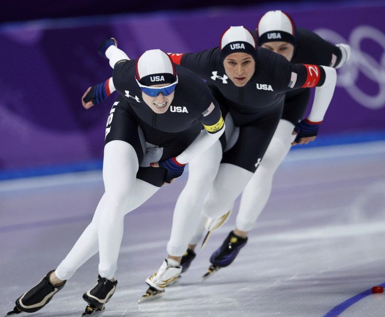 Team USA, with Heather Bergsma, rear, Brittany Bowe, center, and Mia Manganello, front, compete in the women's team pursuit speedskating event in South Korea on Wednesday. They won a bronze medal.