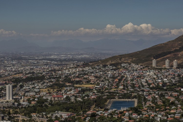 Cape Town, South Africa, a city of 434,000 stretches into the foothills of Table Mountain, with one of its depleted reservoirs seen at lower right. A drought and poor planning by the government have residents scrambling to find their own water sources. 

