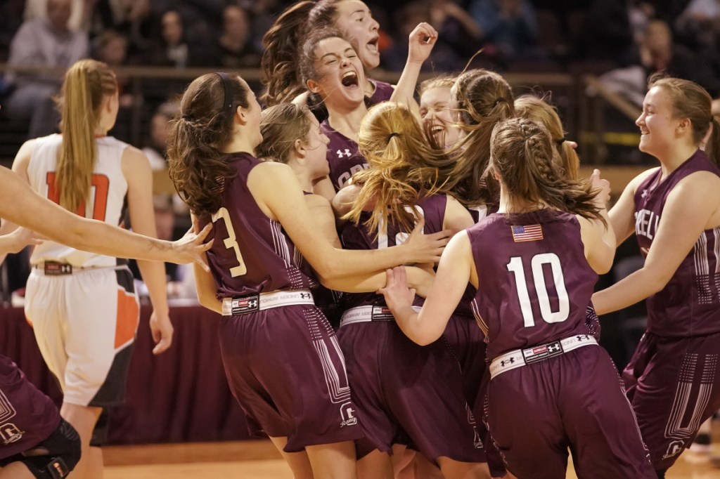 The Greely girls celebrate their victory over Brunswick in the Class A South regional final at the Cross Insurance Arena in Portland on Saturday. The Rangers will play for the state title on Thursday against Hampden Academy.