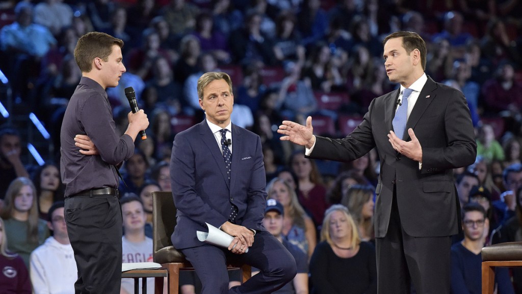 Marjory Stoneman Douglas High School student Cameron Kasky, left, asks a question to Sen. Marco Rubio during a CNN town hall meeting in Sunrise, Fla., Wednesday.