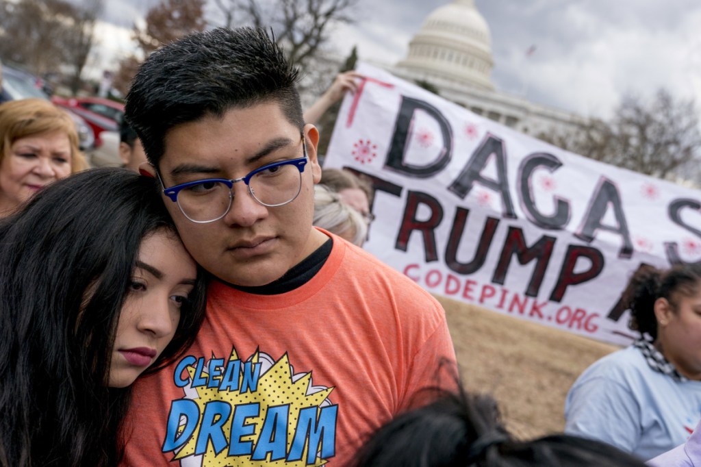 Immigration advocates hold a rally on Capitol Hill in Washington on Jan. 23. The U.S. Supreme Court on Monday denied the Trump administration's unusual request to overrule a judge who kept alive a program that shields young immigrants from deportation.