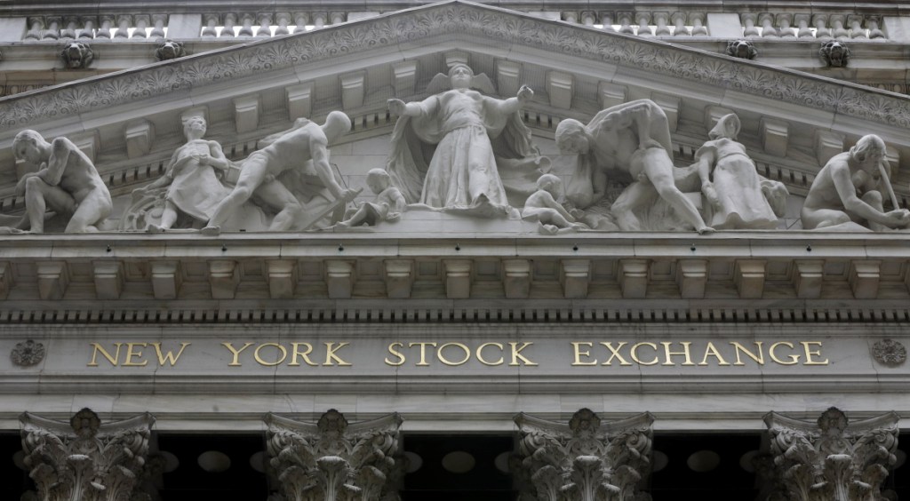 FILE - This Oct. 4, 2014, file photo, shows the facade of the New York Stock Exchange. The U.S. stock market opens at 9:30 a.m. EST on Monday, Feb. 26, 2018. (AP Photo/Richard Drew, File)