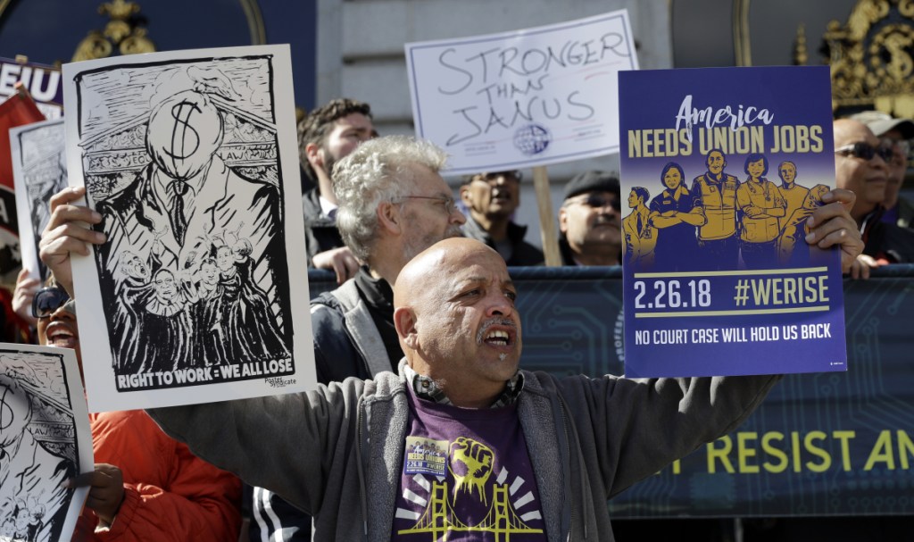 A demonstration involving various labor union groups Monday in San Francisco. The Supreme Court is divided in a major organized labor case over "fair share" fees that nonmembers pay to help cover the costs of negotiations.