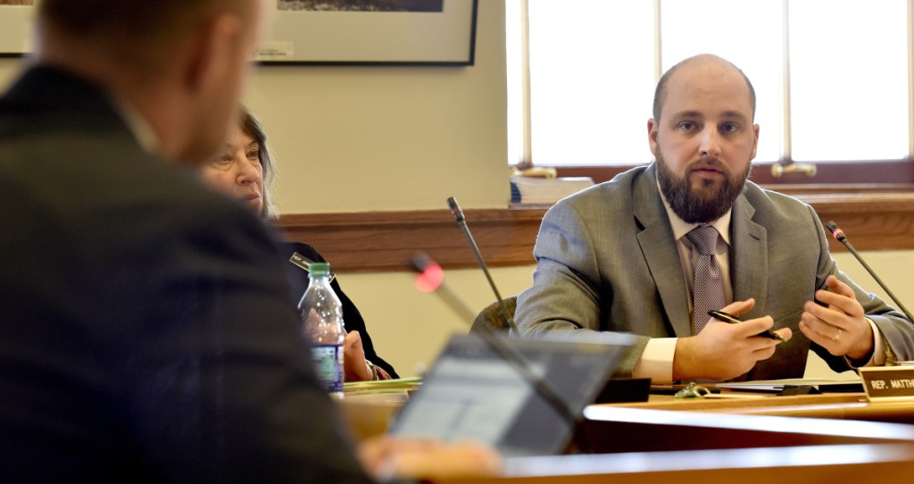 Joint Standing Committee on Taxation member Rep. Matthew Pouliot questions Nick Adolphsen, an adviser to Gov. Paul LePage, about an amendment proposed for L.D. 1629, an Act To Protect the Elderly from Tax Lien Foreclosures, on Tuesday at the State House in Augusta.