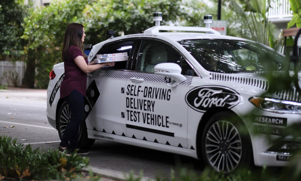 A self-driving vehicle from Ford in Miami, Fla. Ford, Domino's Pizza and other partners are testing to see how consumers react to autonomous delivery vehicles.