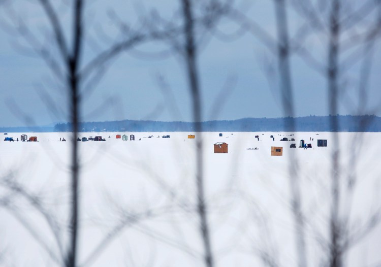 Ice fishing shacks line Lower Bay on Sebago Lake in Standish.