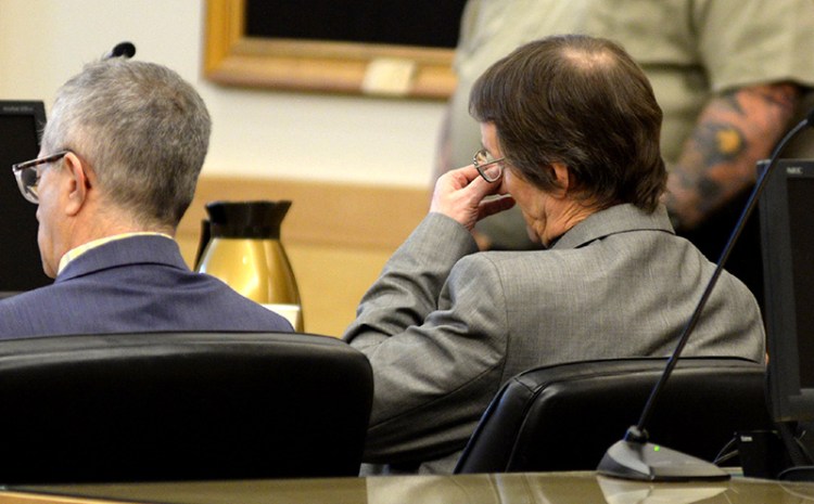Philip Scott Fournier sits in the courtroom shortly before he was found guilty of murdering Joyce McLain in 1980. Fournier showed no emotion as Superior Court Justice Ann Murray delivered the verdict on Thursday at the Penobscot Judicial Center in Bangor.  Seated to Fournier's left is his attorney Jeffrey Silverstein.
