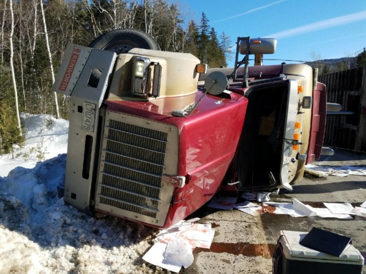 A logging truck driven by Timmy Philippon, 22, of Quebec, rolled over Tuesday afternoon on Route 27 in Chain of Ponds Township, closing the road for about three hours, Trooper Jillian Monahan said.
