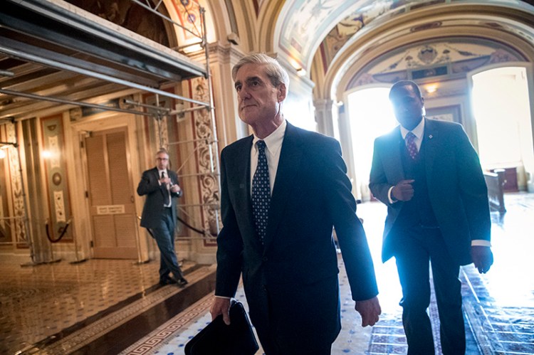 FILE - In this 2017 photo, Special Counsel Robert Mueller departs after a closed-door meeting with members of the Senate Judiciary Committee about Russian meddling in the election at the Capitol in Washington. 