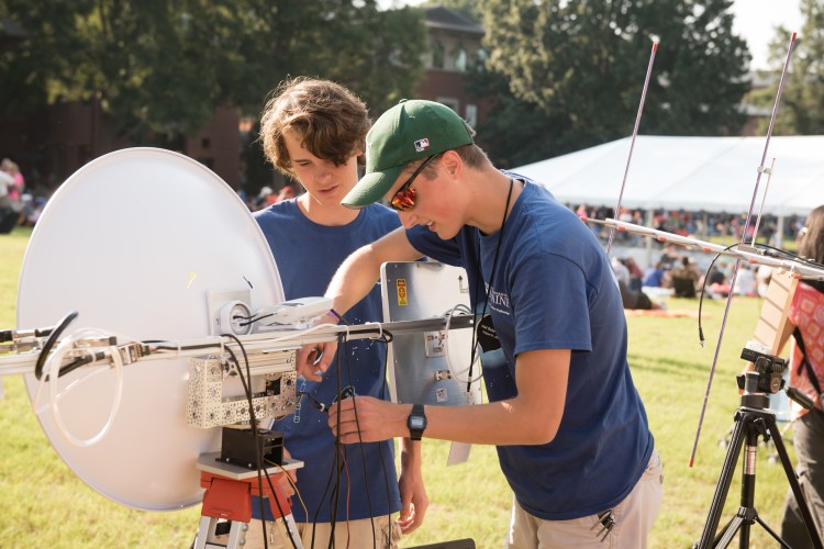 Two engineering students verify that telemetry is being received at the primary ground station. They were among those from the UMaine community who traveled to Clemson, S.C., in August to participate in the first-ever NASA Great American Eclipse
Project.
