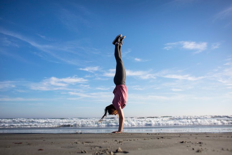  When Anna Malone, 15, of South Portland did handstands at Higgins Beach a week ago the weather was in the mid-60s.  Yesterday, it hit 57 degrees according to timeanddate.com. Today, the high is predicted to be 50 degrees. 