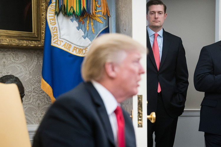 White House staff secretary Rob Porter watches as President Trump speaks during a meeting with North Korean defectors in the Oval Office on Feb. 2. 