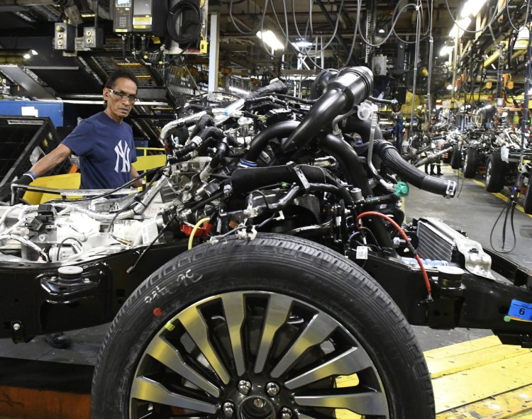 Workers assemble trucks at a Ford plant in Louisville, Ky. Among 18 manufacturing industries, 15 reported growth in February, including transportation equipment and electronics.
