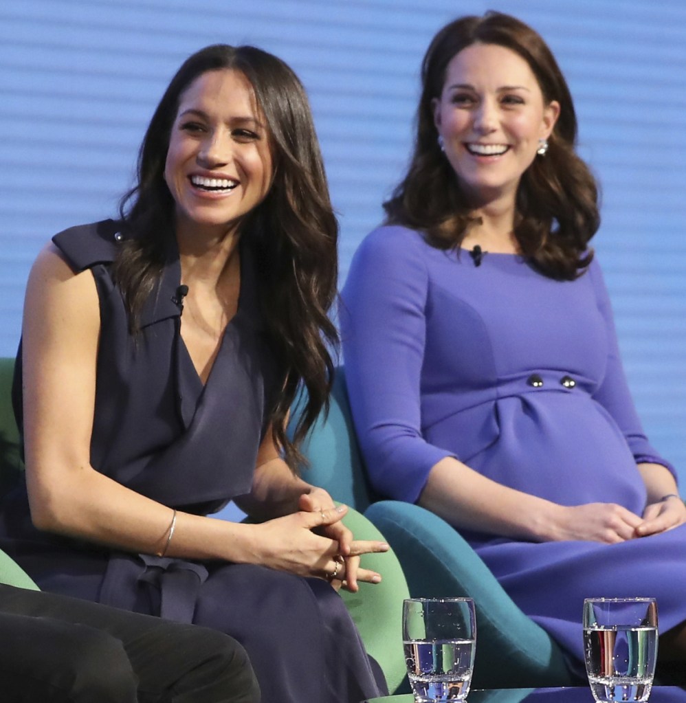 Britain's Kate, duchess of Cambridge, right, and Meghan Markle attend the first Royal Foundation Forum in London in March, with the theme "Making a Difference Together."