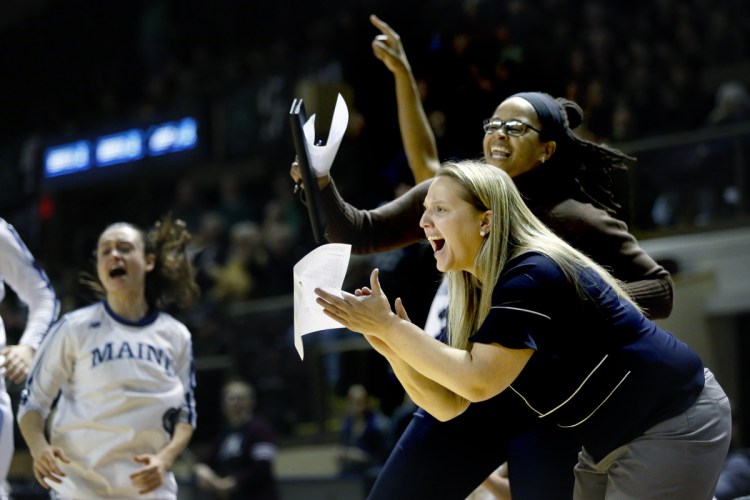 Amy Vachon cheers on the University of Maine women's basketball team during a game versus Binghamton at the America East tournament at the Cross Insurance Arena in March 2017. Vachon has signed a four-deal to becomes Maine's head coach.