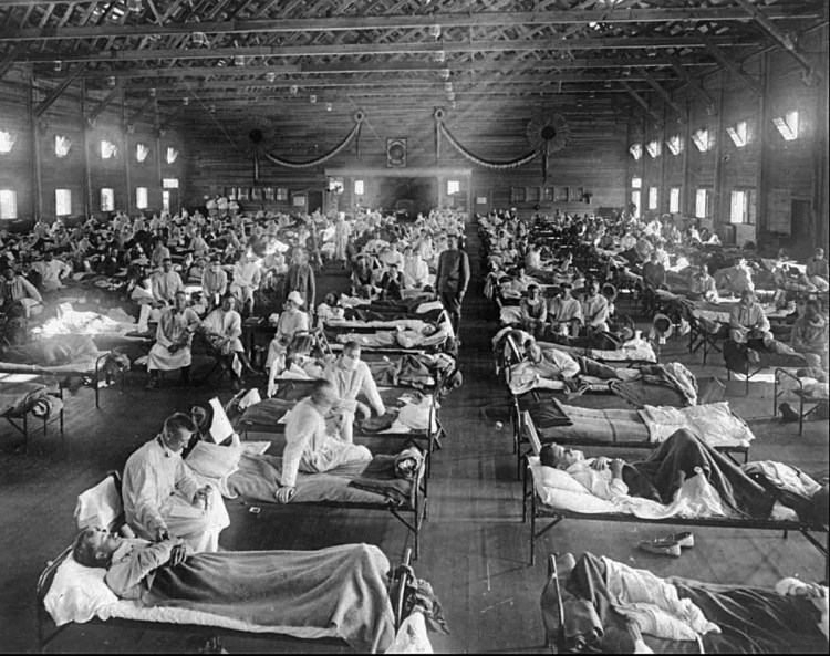 Influenza victims crowd into an emergency hospital near Fort Riley, Kansas, in 1918. The Spanish flu pandemic killed at least 50 million people worldwide. Experts today agree that it's only a matter of time before a combination of risk factors makes us vulnerable to another – possibly overdue – pandemic.
