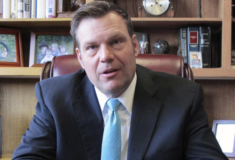 Kansas Secretary of State Kris Kobach is defending a requirement that people provide a birth certificate or passport at the time they register to vote.