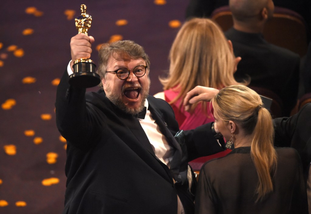 Guillermo del Toro, winner of the award for best director for "The Shape of Water," which also won best picture, celebrates at the Oscars on Sunday at the Dolby Theatre in Los Angeles.