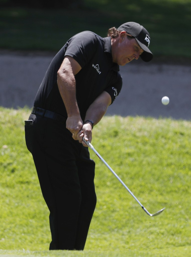 Phil Mickelson approaches the green on the first hole Sunday in Mexico City. Mickelson rallied with two late birdies and then won on the first playoff hole for the win.