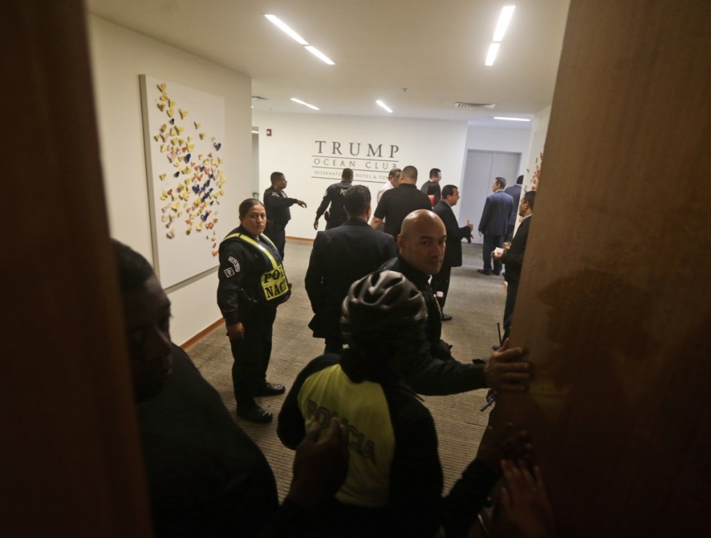 Panamanian police inside the Trump Ocean Club International Hotel and Tower in Panama City on Monday after a court there gave control of the property to majority owner Orestes Fintiklis.