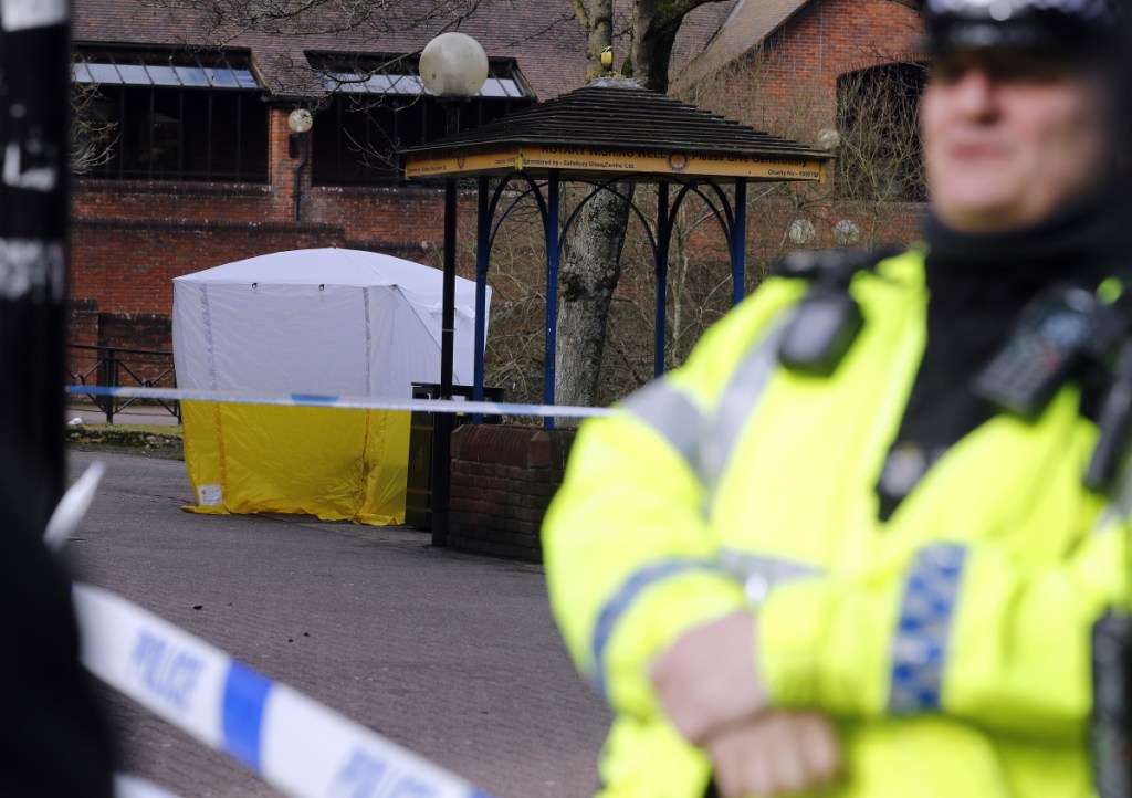 A police tent covers the spot in Salisbury, England, where former Russian spy double agent Sergei Skripal and his daughter, Yulia were found unconscious on a park bench Sunday following exposure to an "unknown substance."